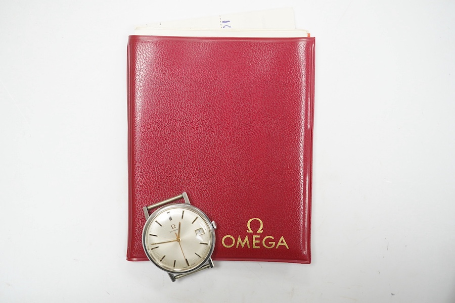 A gentleman's stainless steel Omega manual wind wrist watch, with baton numerals and date aperture, case diameter 34mm, no strap, with a 1970's service receipt. Condition - fair